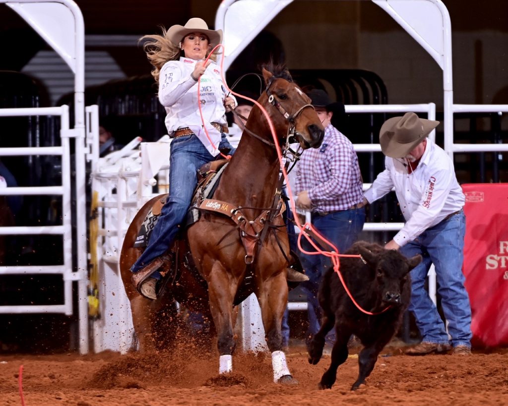 Jackie Crawford ropes her calf at the Fort Worth Stock Show & Rodeo breakaway roping.