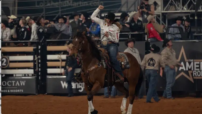 Jackie Crawford celebrates after clinching The American Rodeo win.